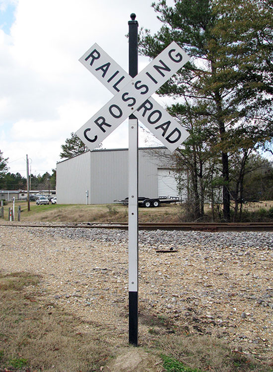 Brite Max Post Reflector on a Post under Crossbucks Railroad Sign
